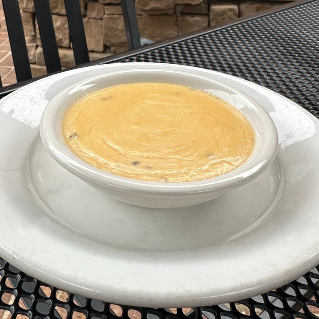 *Cup of Cheese Sauce*.